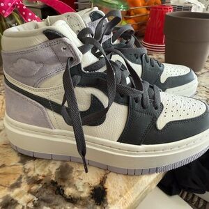 Nike Women's lavender and navy air jordan’s